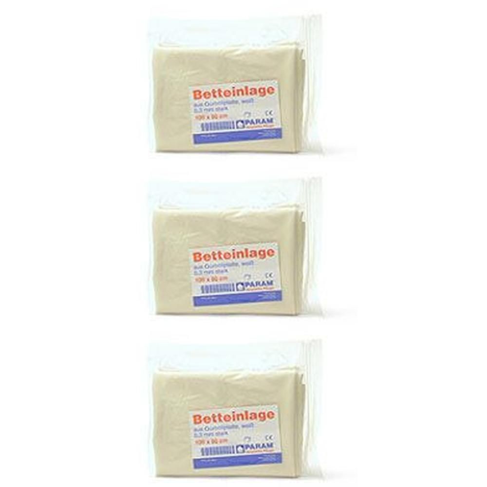 Drei verpackte Bettauflagen aus Baumwolle, weiß, 100 x 90 cm.