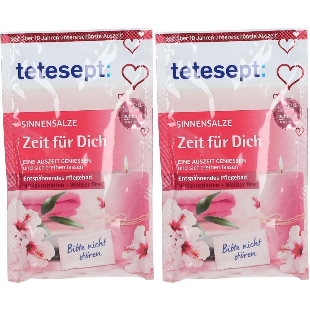 Zwei Packungen tetesept Sinnensalze Zeit für Dich mit Kerze und Blumen. "Bitte nicht stören" Schild.