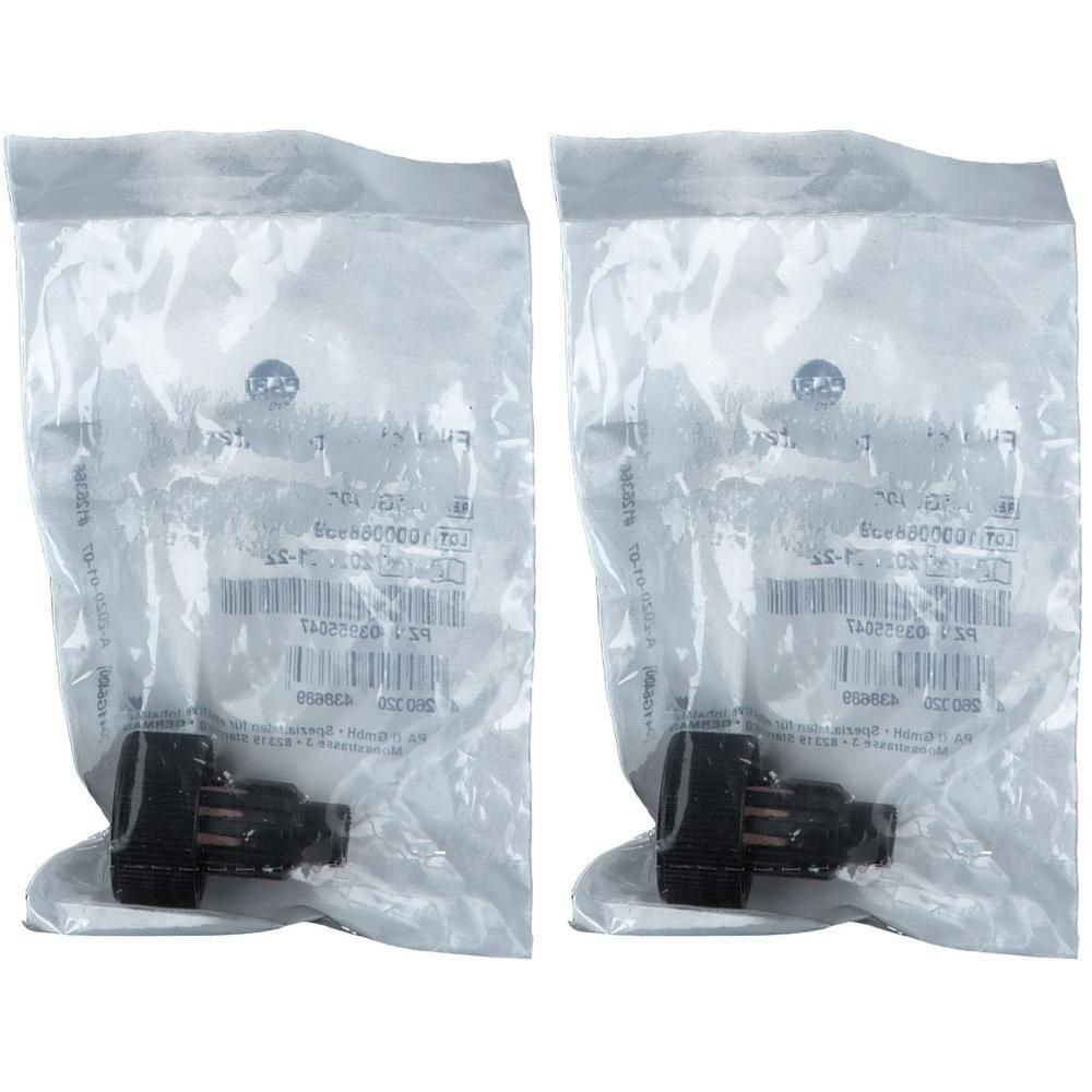 Zwei schwarze Filter in versiegelten Plastiktüten, mit Etiketten und Barcodes.