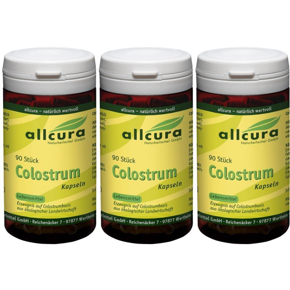Drei Dosen allcura Colostrum Kapseln, jeweils 90 Stück, mit gelbem Etikett und weißem Deckel.