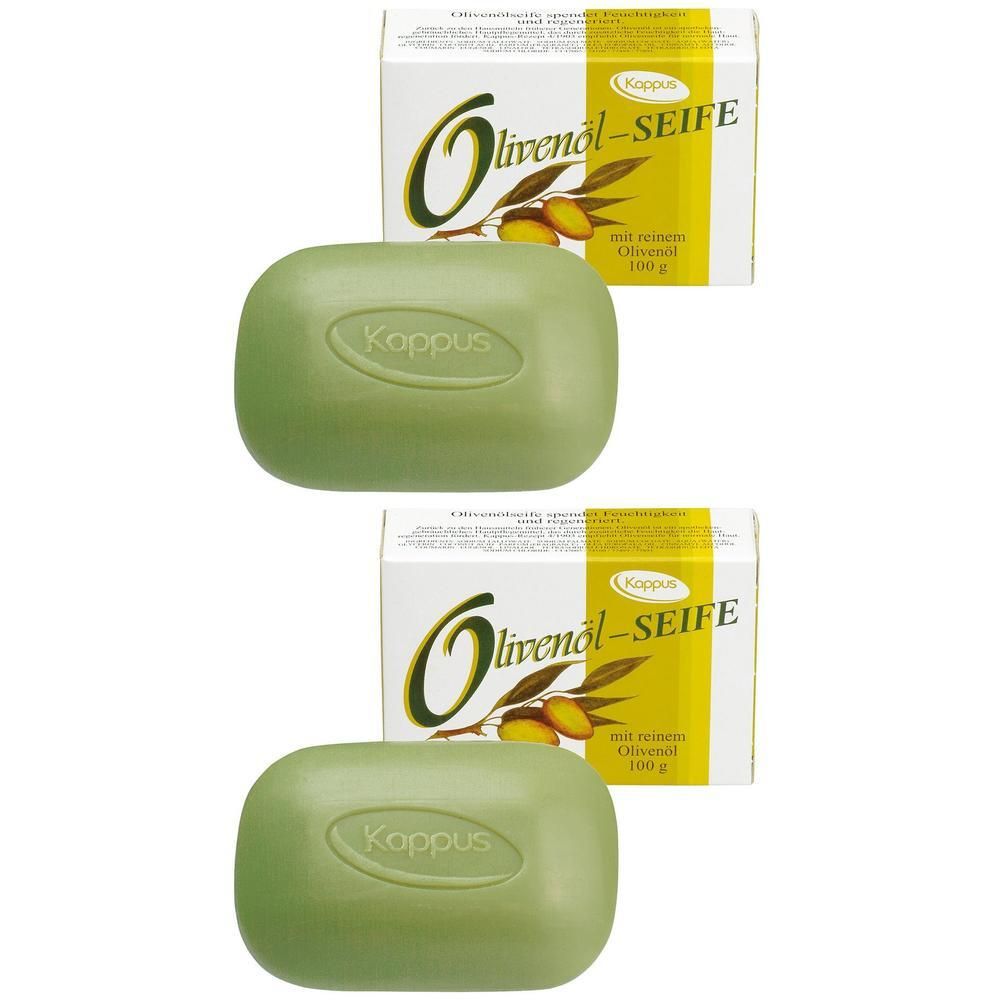Zwei grüne Kappus Olivenöl Seifenstücke mit Verpackung. Jede Seife hat eine ovale Form und das Koppus Logo.