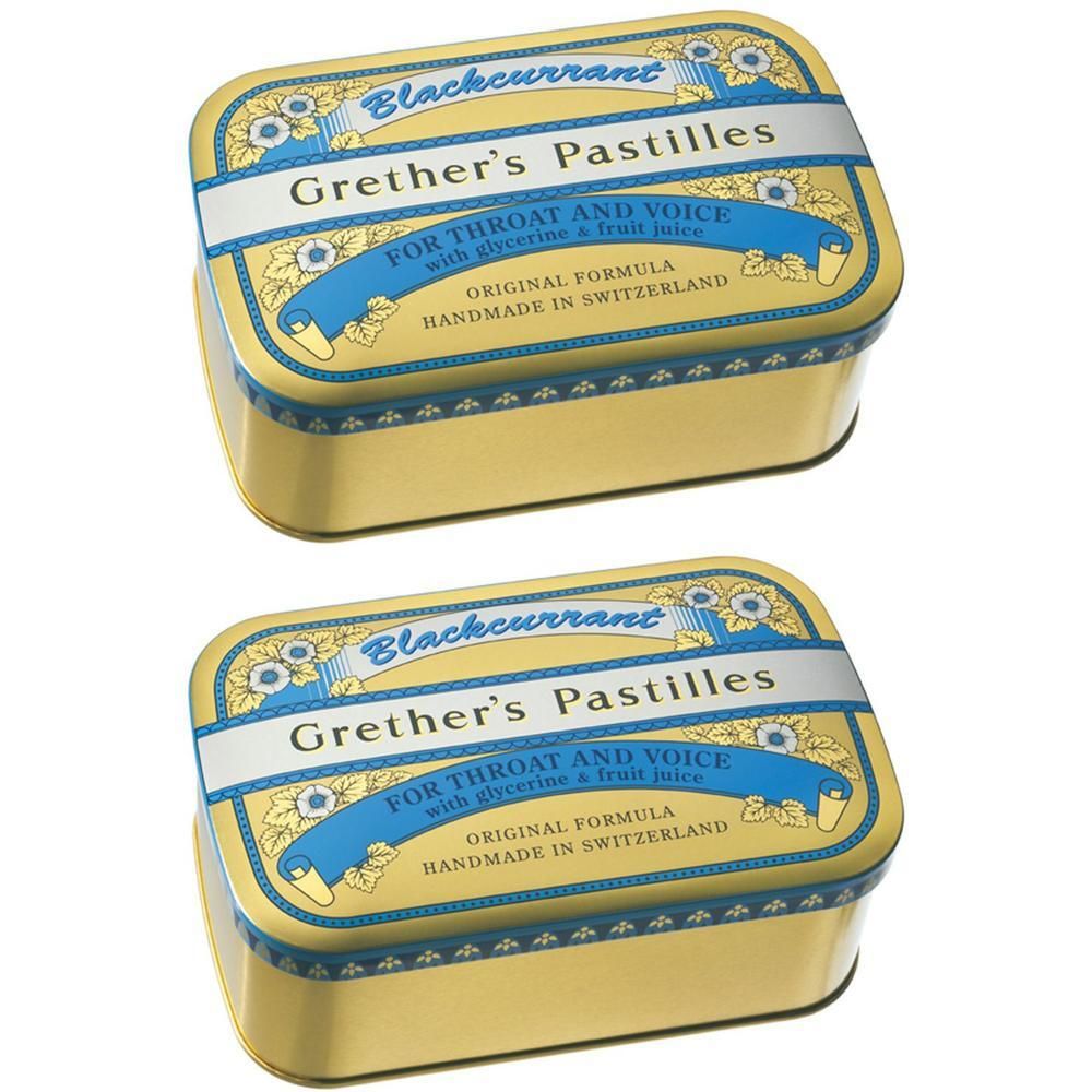 Zwei gelbe Dosen Grether's Pastilles mit schwarzer Johannisbeere, handgemacht in der Schweiz.