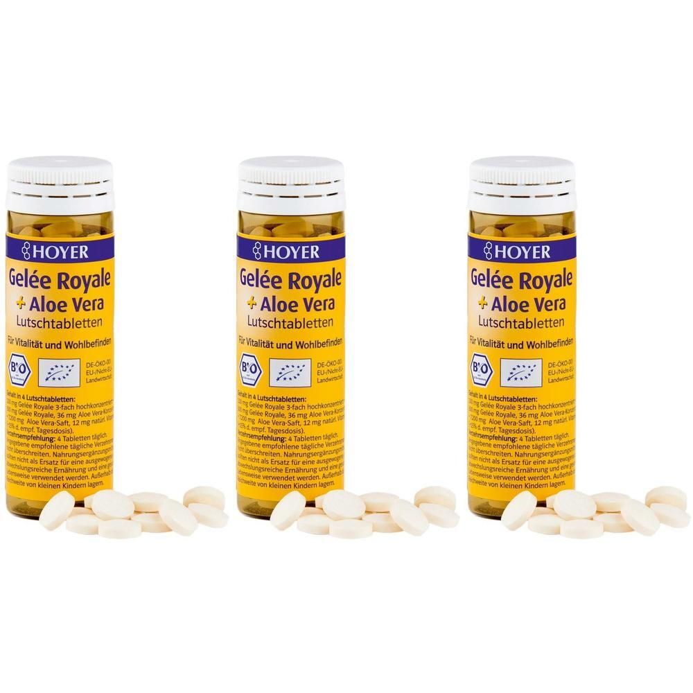 Drei Flaschen HOYER Gelée Royale + Aloe Vera Lutschtabletten mit verstreuten Tabletten davor.