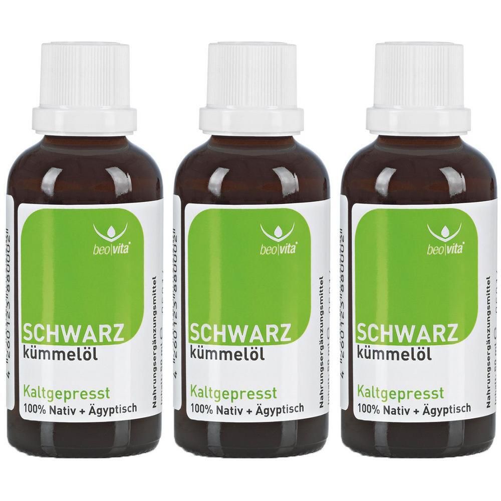 Drei braune Glasflaschen mit schwarzem Kümmelöl, kaltgepresst, 100% Nativ + Ägyptisch.