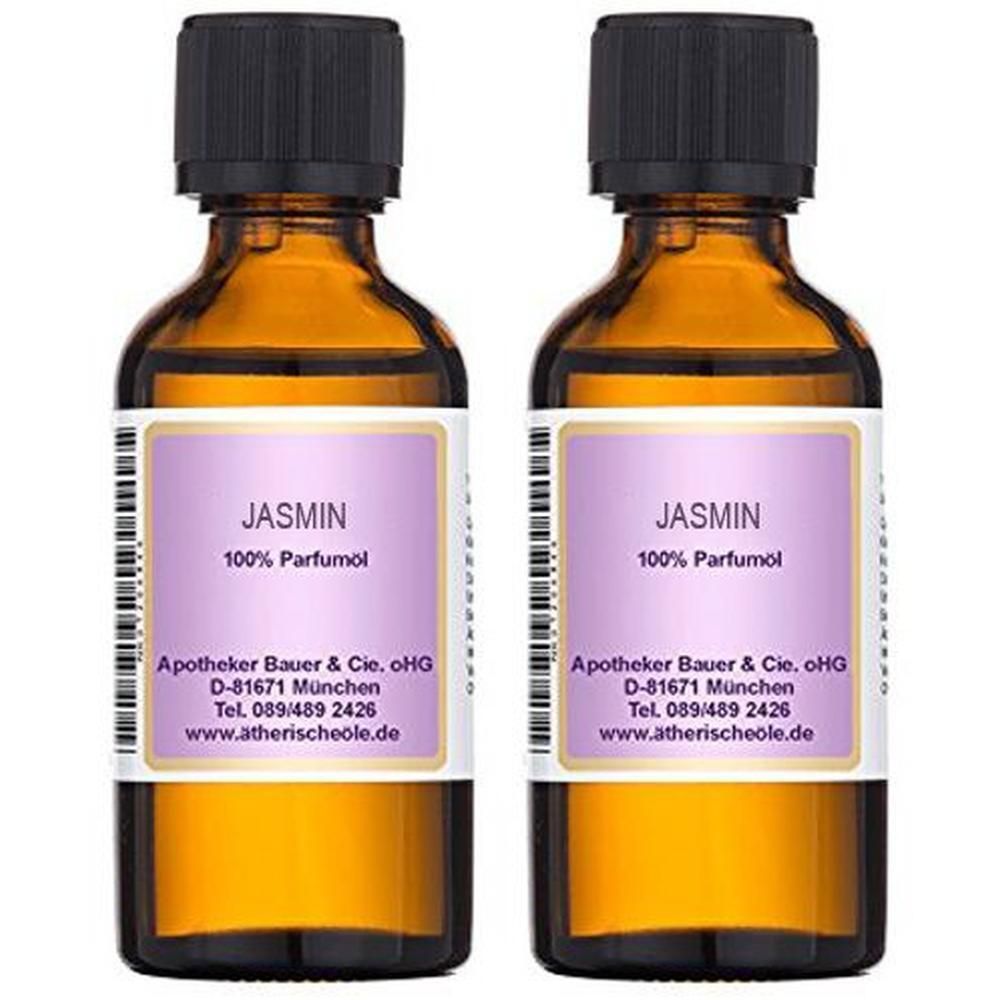 Zwei Flaschen Jasmin 100% Parfumöl mit schwarzen Verschlüssen. Braune Glasflaschen mit lila Etiketten.