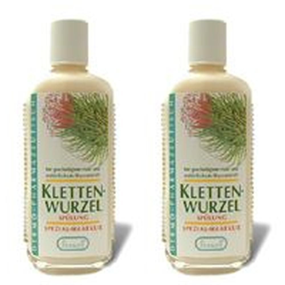 Zwei Flaschen Klettenwurzel Spülung mit Etikett, das eine Pflanze zeigt.