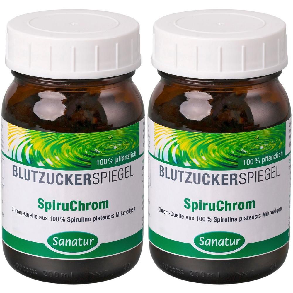Zwei Gläser Sanatur SpiruChrom mit Etikett 'Blutzuckerspiegel'. Braune Glasbehälter mit weißen Deckeln.