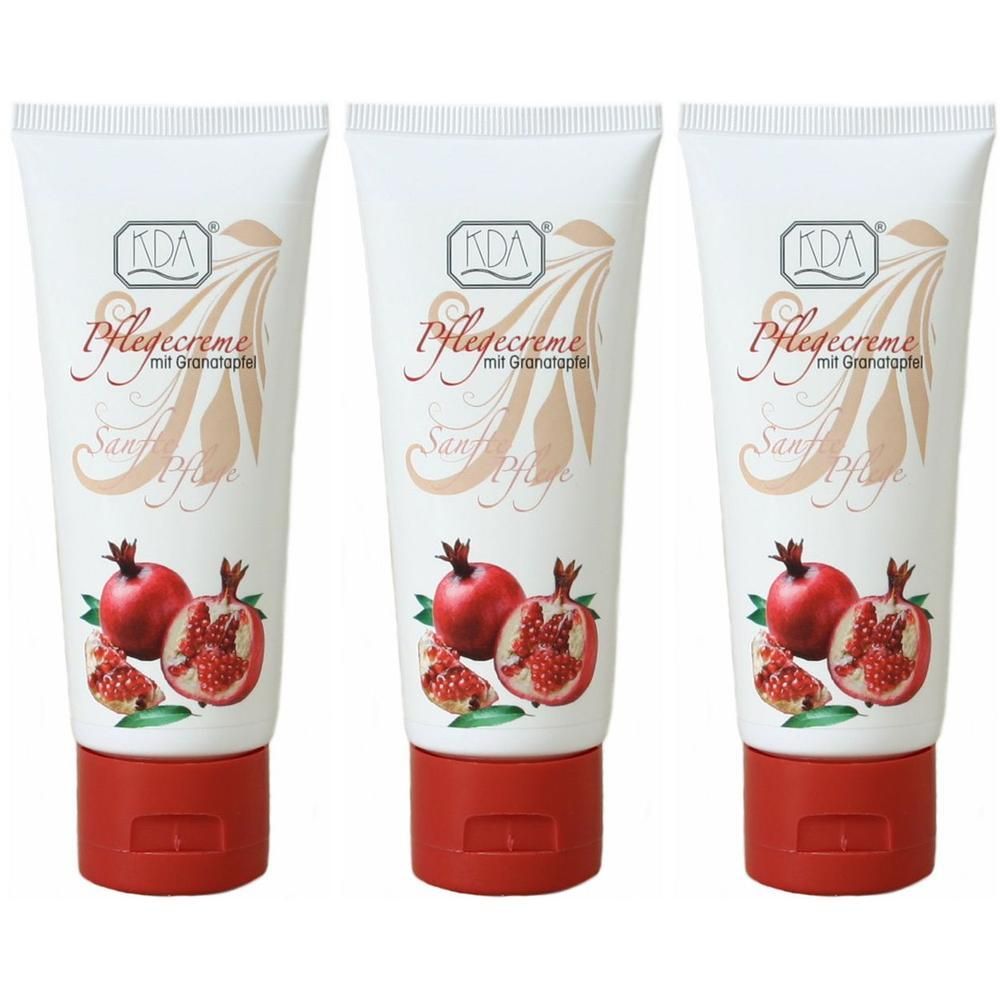 Drei Tuben KDA Pflegecreme mit Granatapfel und roten Früchten.
