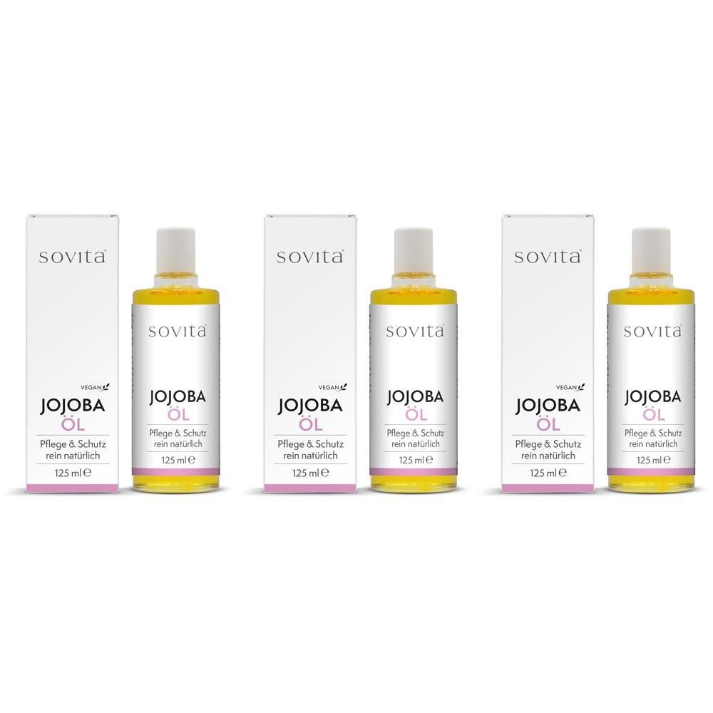 Drei Flaschen SoVitabeauty Jojoba Öl Golden Balance mit Verpackung.