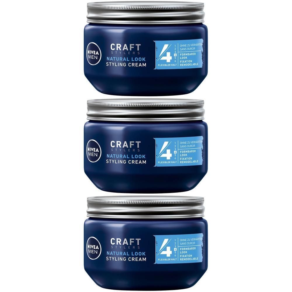 Drei NIVEA MEN Styling Cream Tiegel mit silbernen Deckeln.