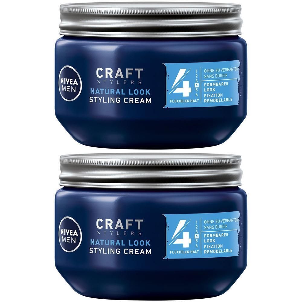 Zwei NIVEA MEN Craft Stylers Natural Look Styling Cream Tiegel mit silbernen Schraubverschlüssen.