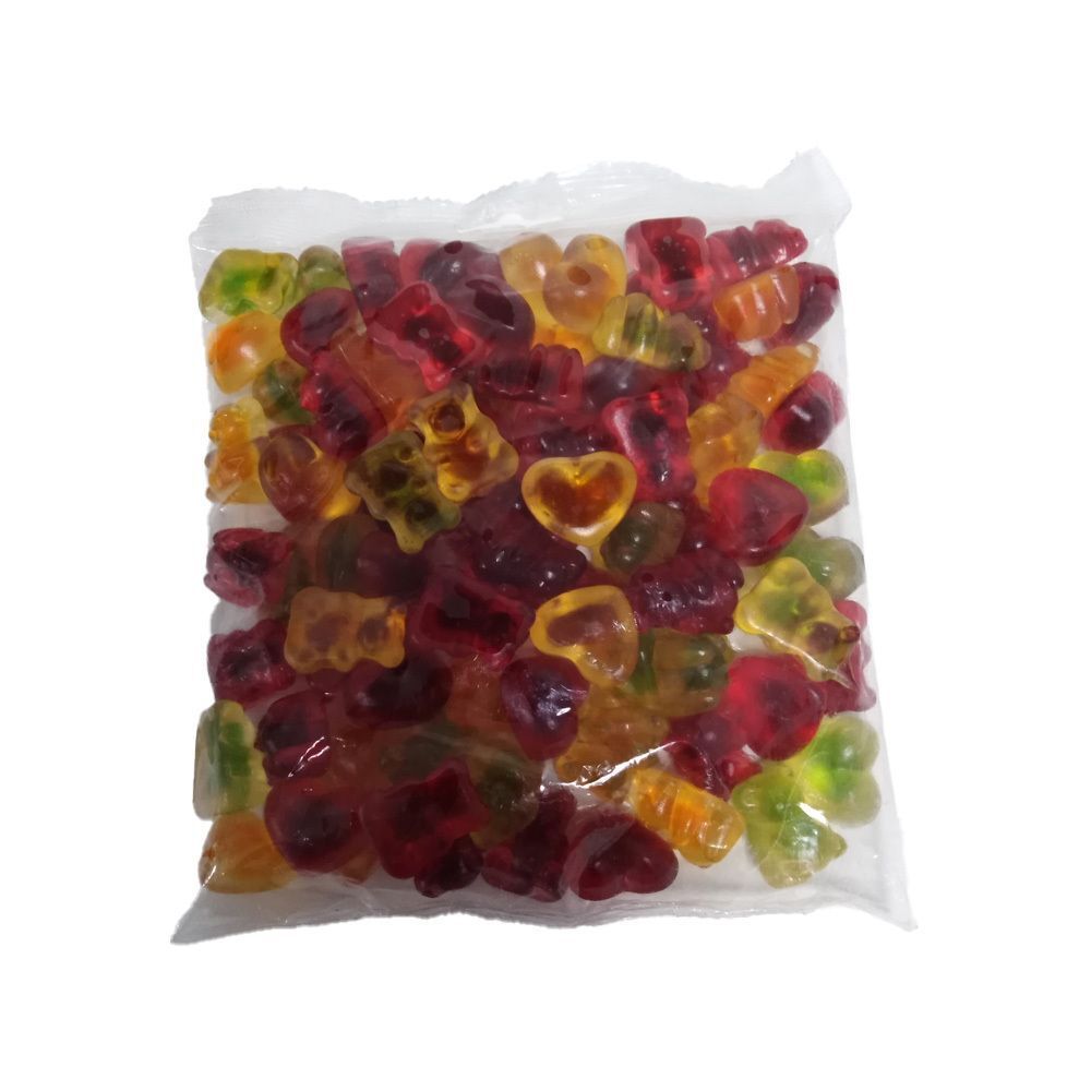 Ein Beutel mit bunten Fruchtgummis in Bären- und Herzform.