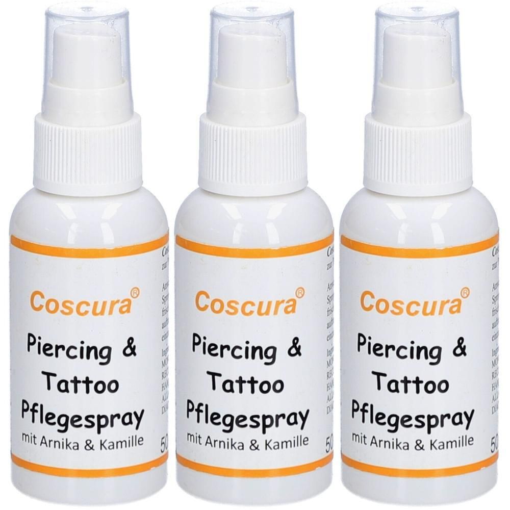 Drei Flaschen Coscura Piercing & Tattoo Pflegespray mit Arnika & Kamille.