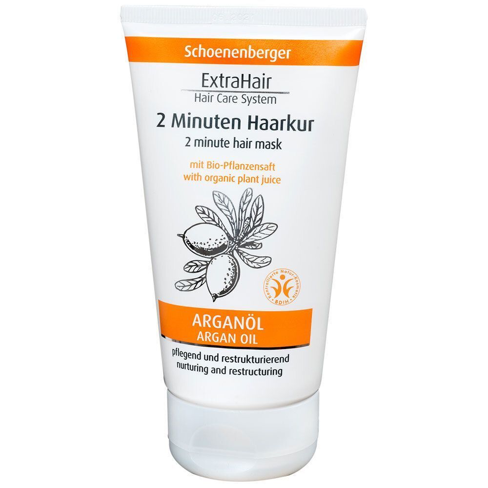 Weiße Tube Schoenenberger ExtraHair 2 Minuten Haarkur mit Arganöl. Vorderseite mit Produktinformationen und Pflanzenabbildung.