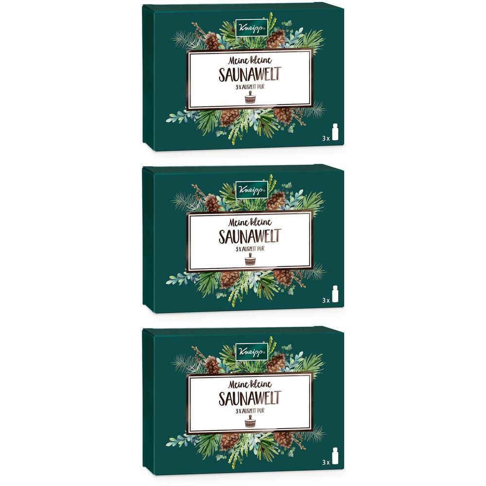 Drei Schachteln des Kneipp® Meine kleine Saunawelt Geschenksets, mit Tannenzweigen und Zapfen dekoriert.