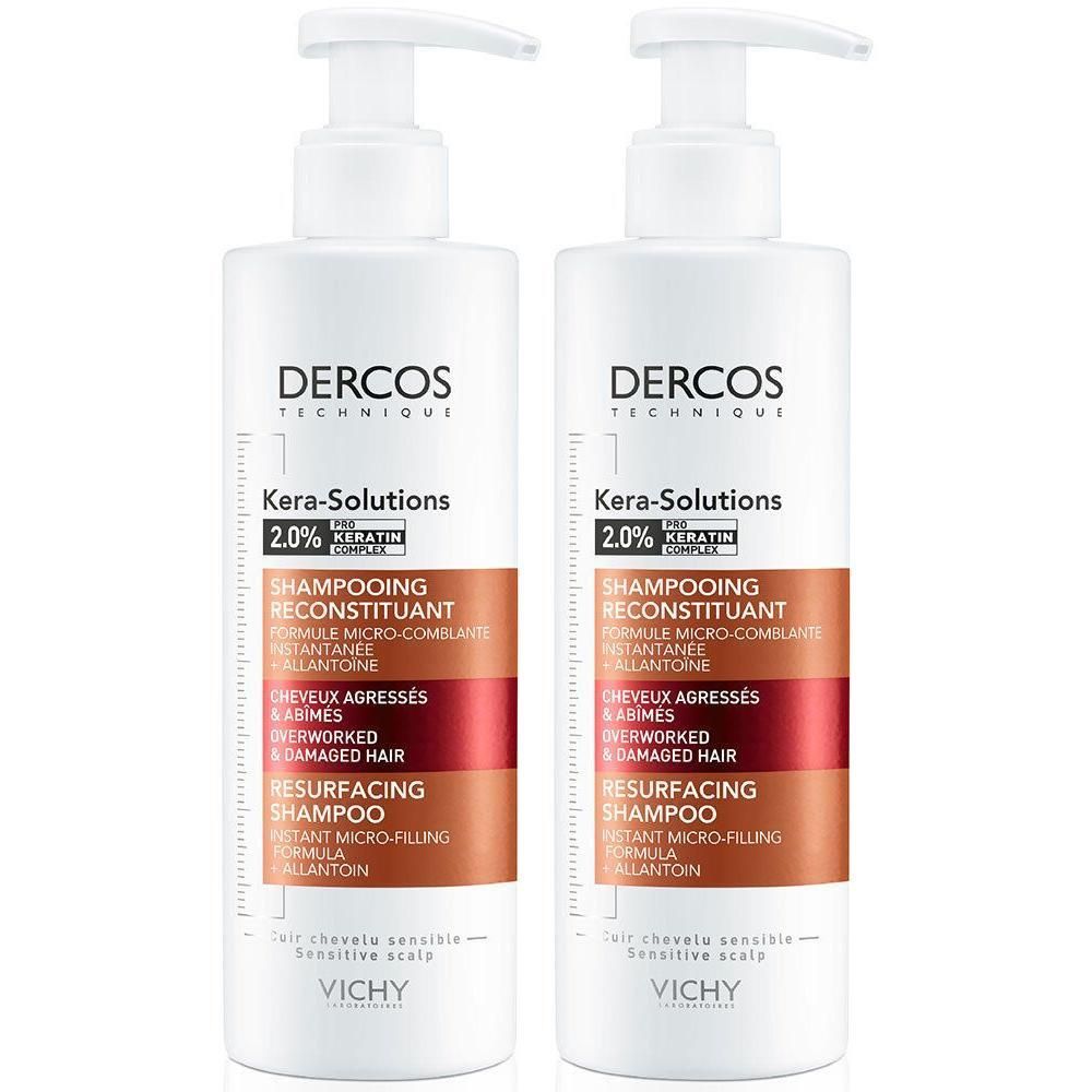 Zwei weiße Pumpspenderflaschen Vichy Dercos Kera-Solutions Shampoo mit Keratin-Komplex.