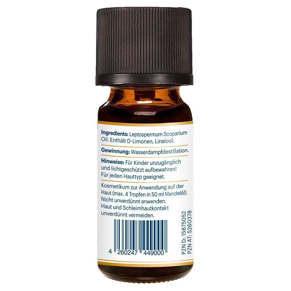 Rückseite einer Flasche Manuka Öl mit Etikett, das Inhaltsstoffe und Anwendungshinweise auflistet.