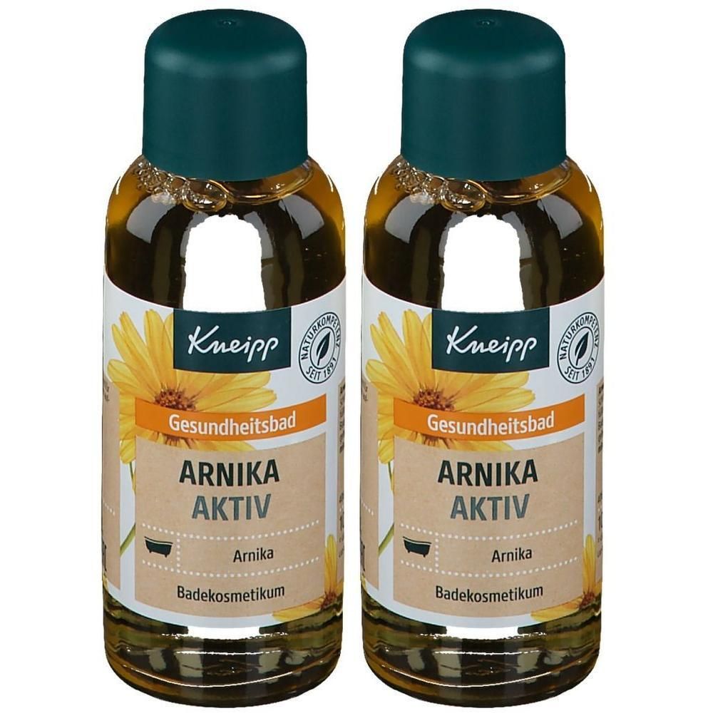 Zwei Flaschen Kneipp Gesundheitsbad Arnika Aktiv mit grünem Deckel und Etikett mit Arnika-Blüte.