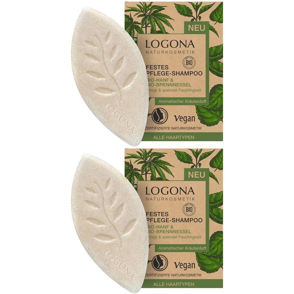 Zwei feste Pflege-Shampoos in Blattform mit LOGONA-Prägung, neben ihren Verpackungen.