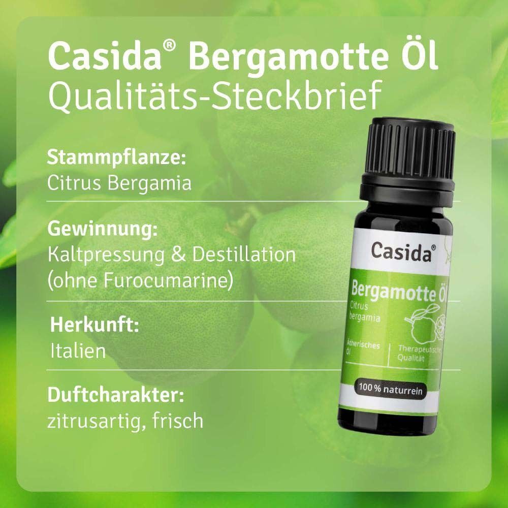 Eine Flasche Casida Bergamotte Öl, 100% naturrein, mit Etikett und schwarzem Schraubverschluss.
