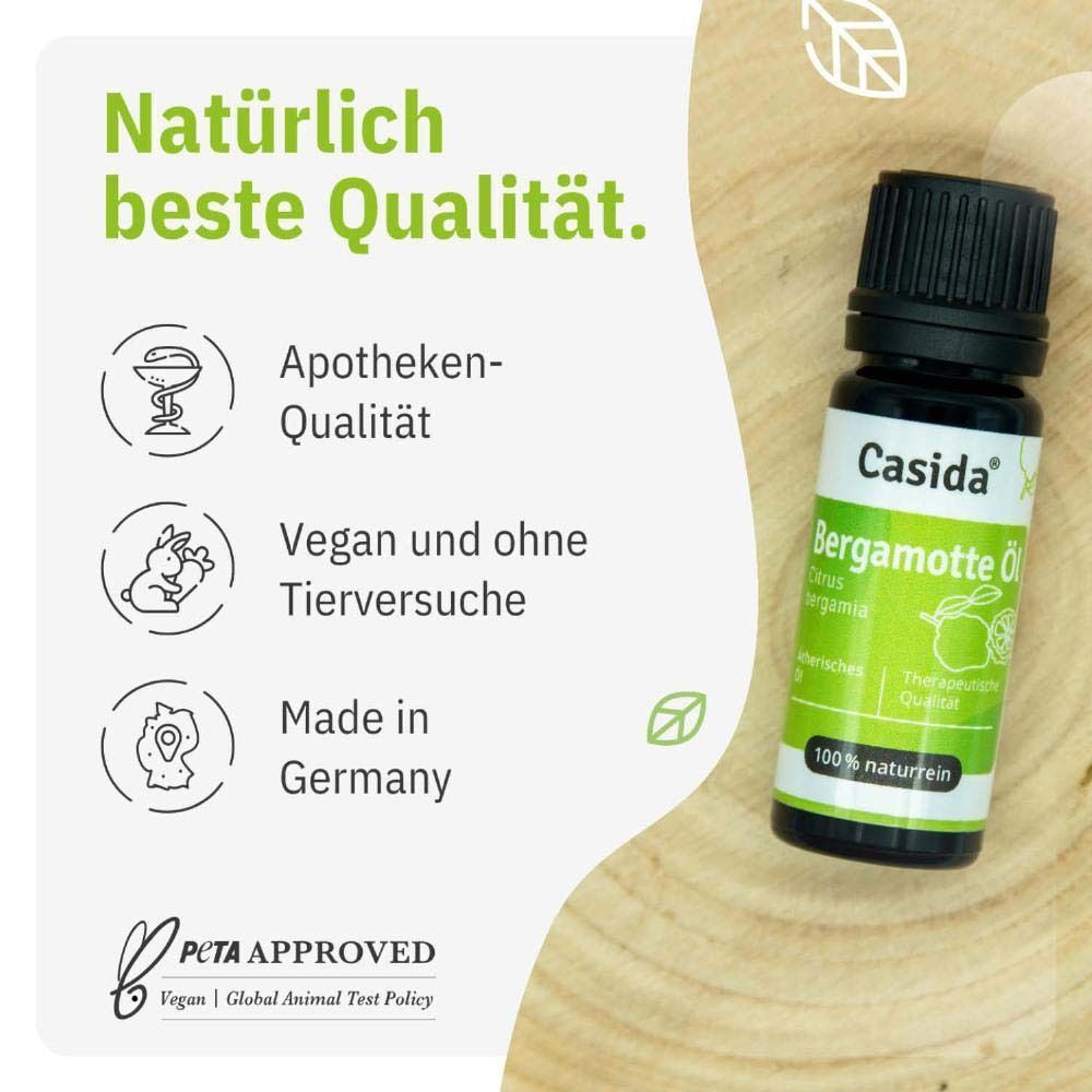 Eine Flasche Casida Bergamotte Öl, 100% naturrein, mit Etikett und schwarzem Schraubverschluss.