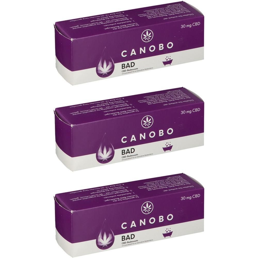 Drei lila Schachteln mit CANOBO BAD CBD-Badezusatz, jeweils 30 mg CBD.