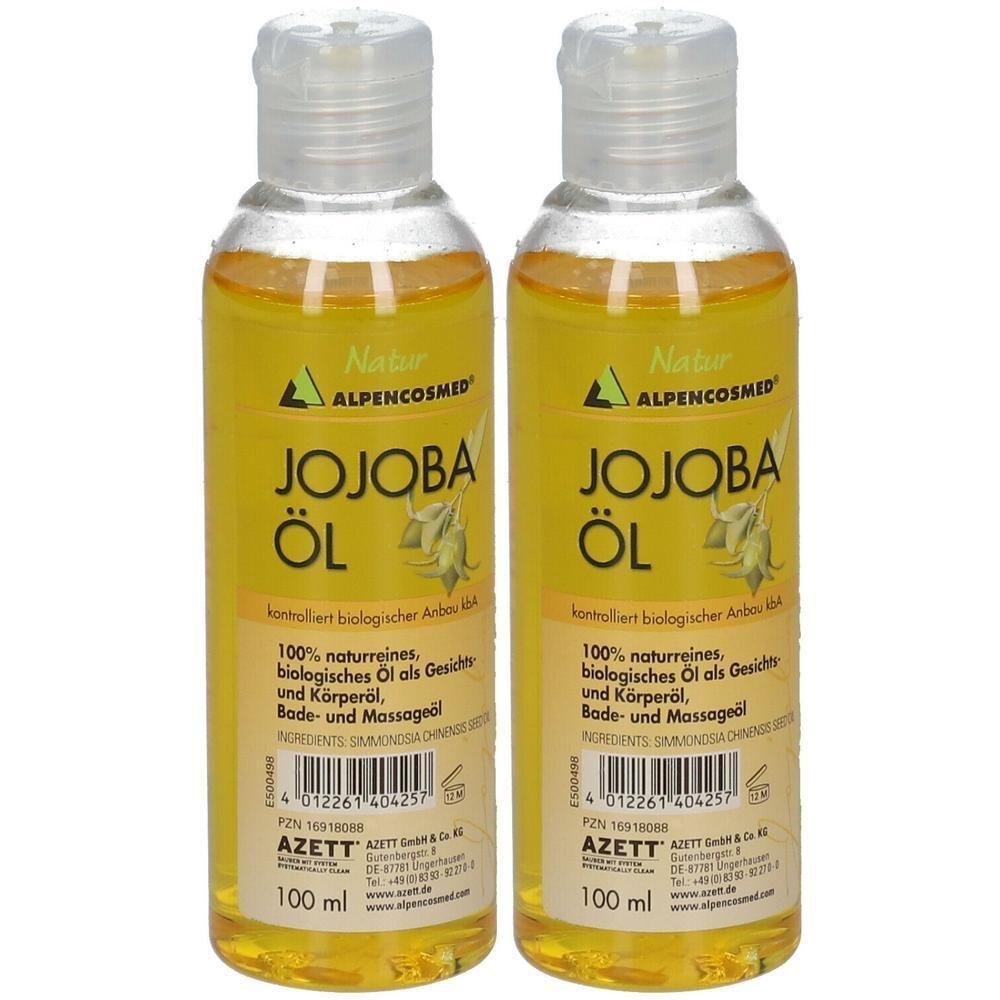 Zwei Flaschen ALPENCOSMED Natur Jojoba Öl, je 100 ml. Klare Flüssigkeit in durchsichtigen Behältern mit weißem Klappverschluss.