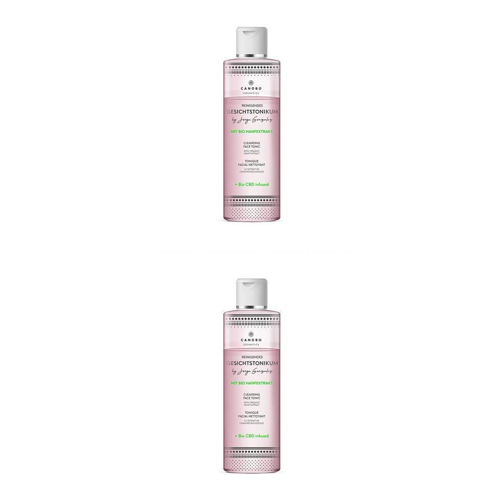 Zwei Flaschen CANOBO Gesichtstonikum mit Bio Hanfextrakt, rosa gefärbt, mit weißem Verschluss.