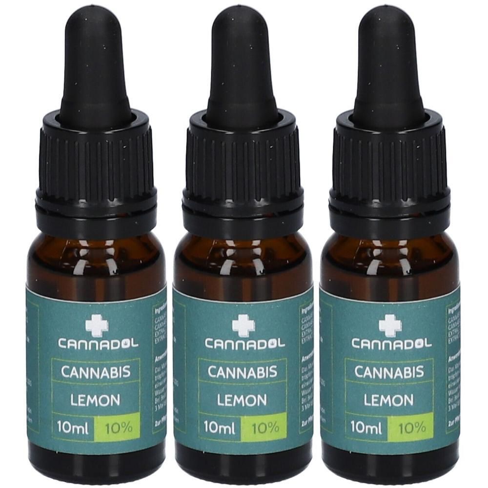 Drei braune Glasflaschen mit Pipettenverschluss, Etikett mit "CANNADOL CANNABIS LEMON 10ml 10%"