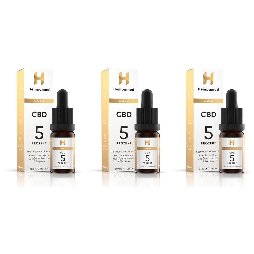 Drei Flaschen Hempamed CBD 5 Prozent Öl mit Pipetten und Verpackungen.