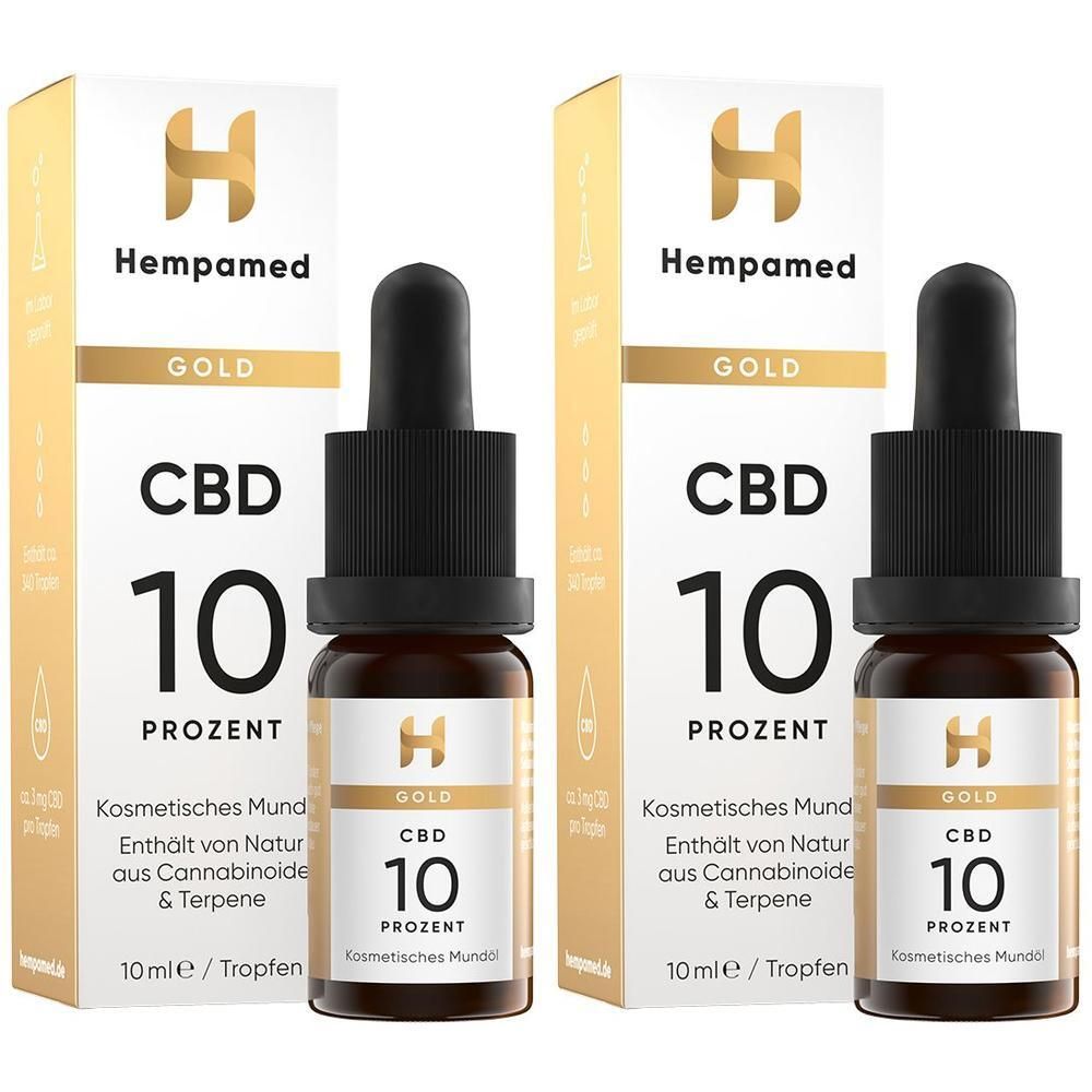 Zwei Packungen Hempamed Gold CBD Öl 10% mit Pipettenflaschen. Goldener Schriftzug "CBD 10 Prozent".