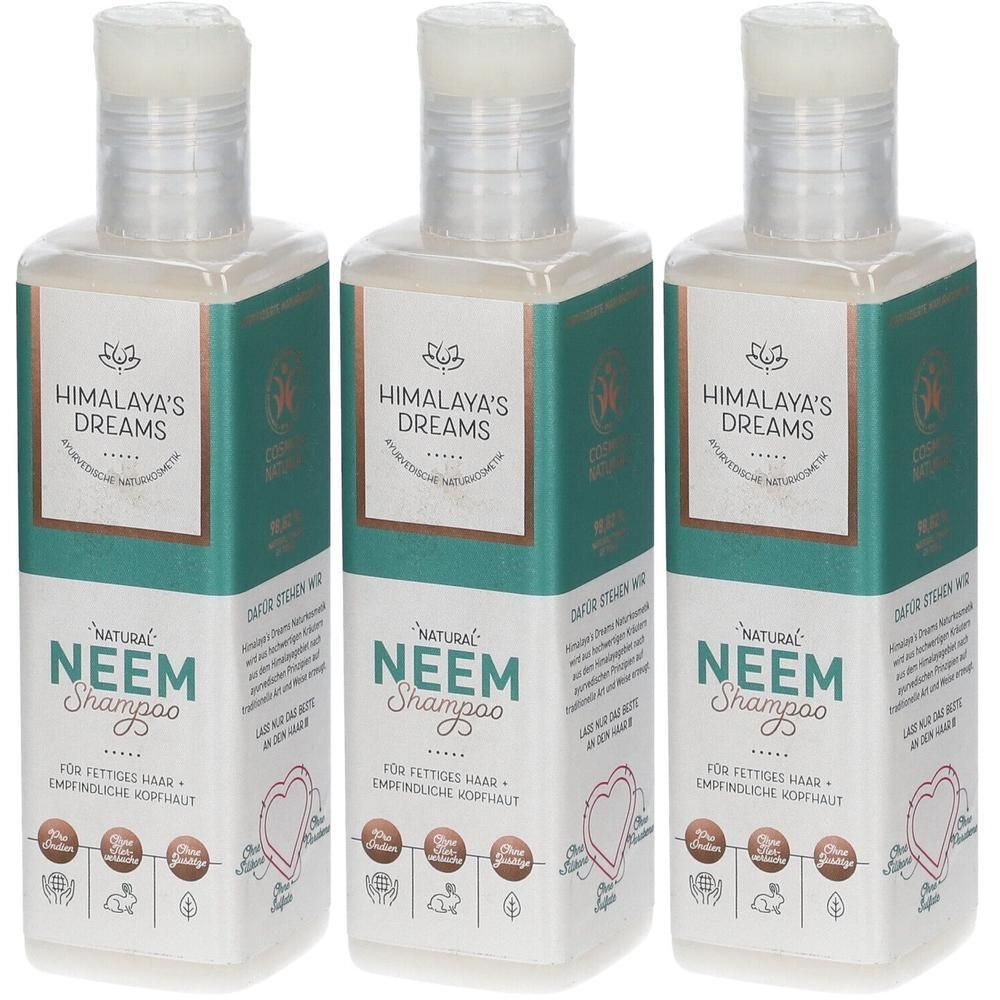 Drei Flaschen Himalaya's Dreams Natural Neem Shampoo mit Etiketten, die Informationen über das Produkt enthalten.