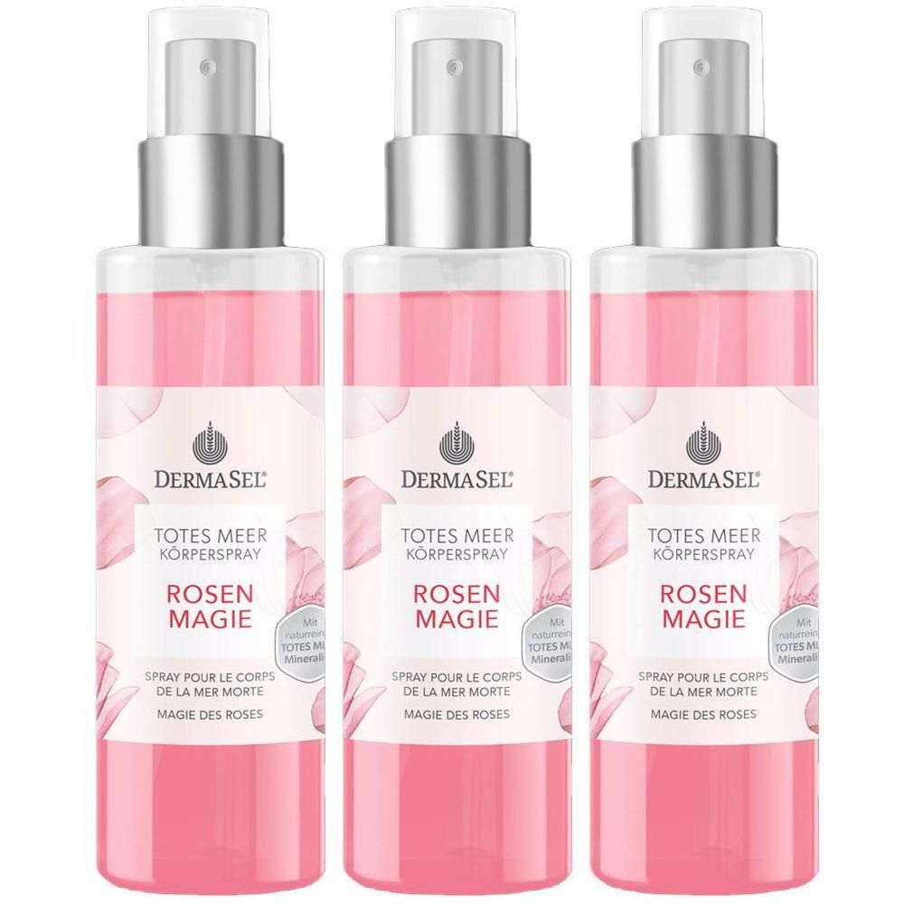 Drei Flaschen DERMASEL® Totes Meer Körperspray Rosen Magie mit silbernen Sprühköpfen und rosa Etiketten.