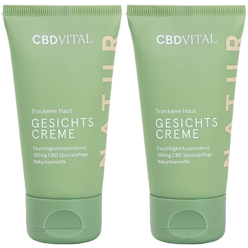 Zwei grüne Tuben CBD VITAL Gesichtscreme für trockene Haut.