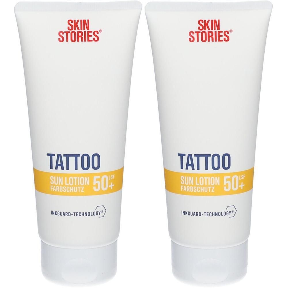 Zwei weiße Tuben SKIN STORIES Tattoo Sun Lotion LSF 50+ mit gelbem Streifen und schwarzer Schrift.
