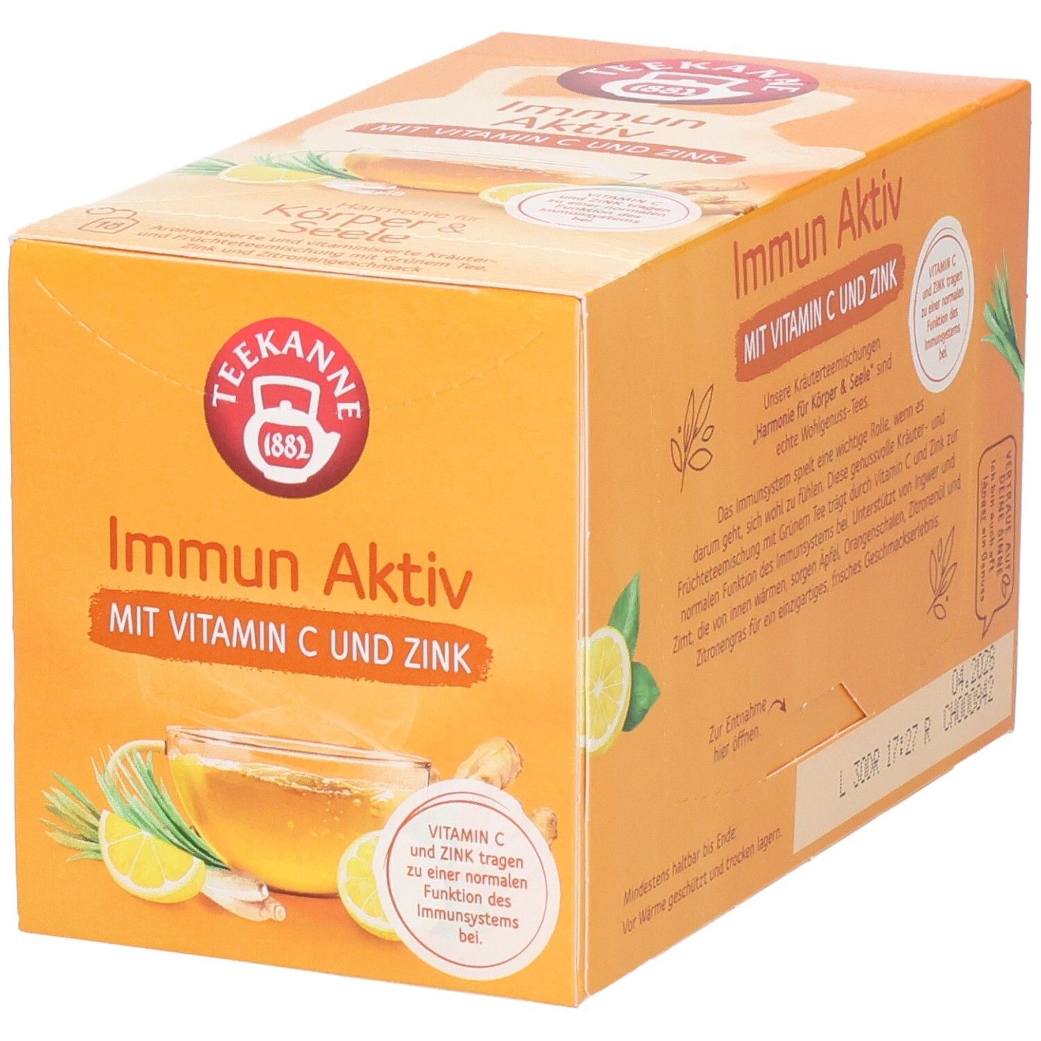 Teekanne Immun Aktiv Teebox mit Vitamin C und Zink. Fokus auf die Teekanne und Zitronenscheiben.