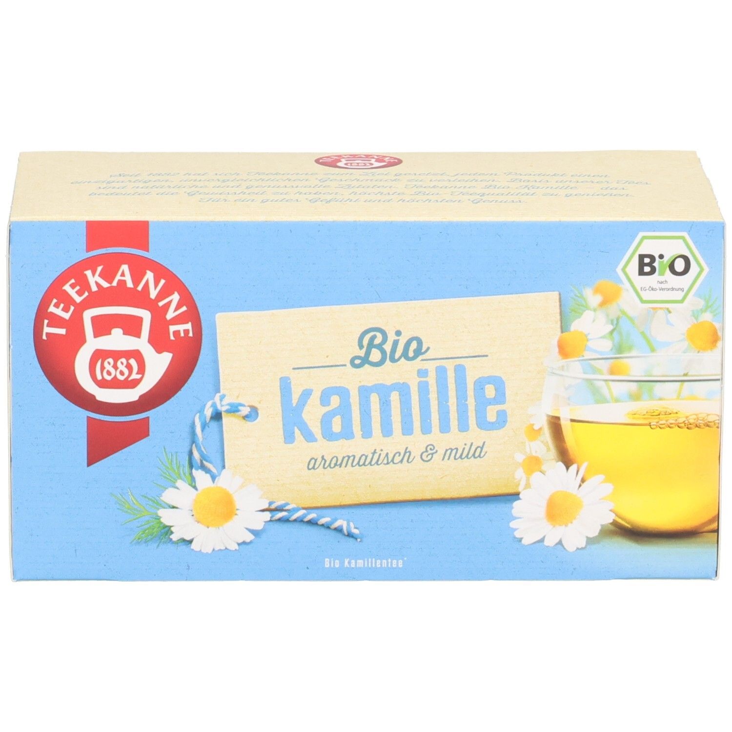 Vorderseite der Teekanne BIO Kamille Verpackung mit Kamillenblüten und einer Tasse Tee.