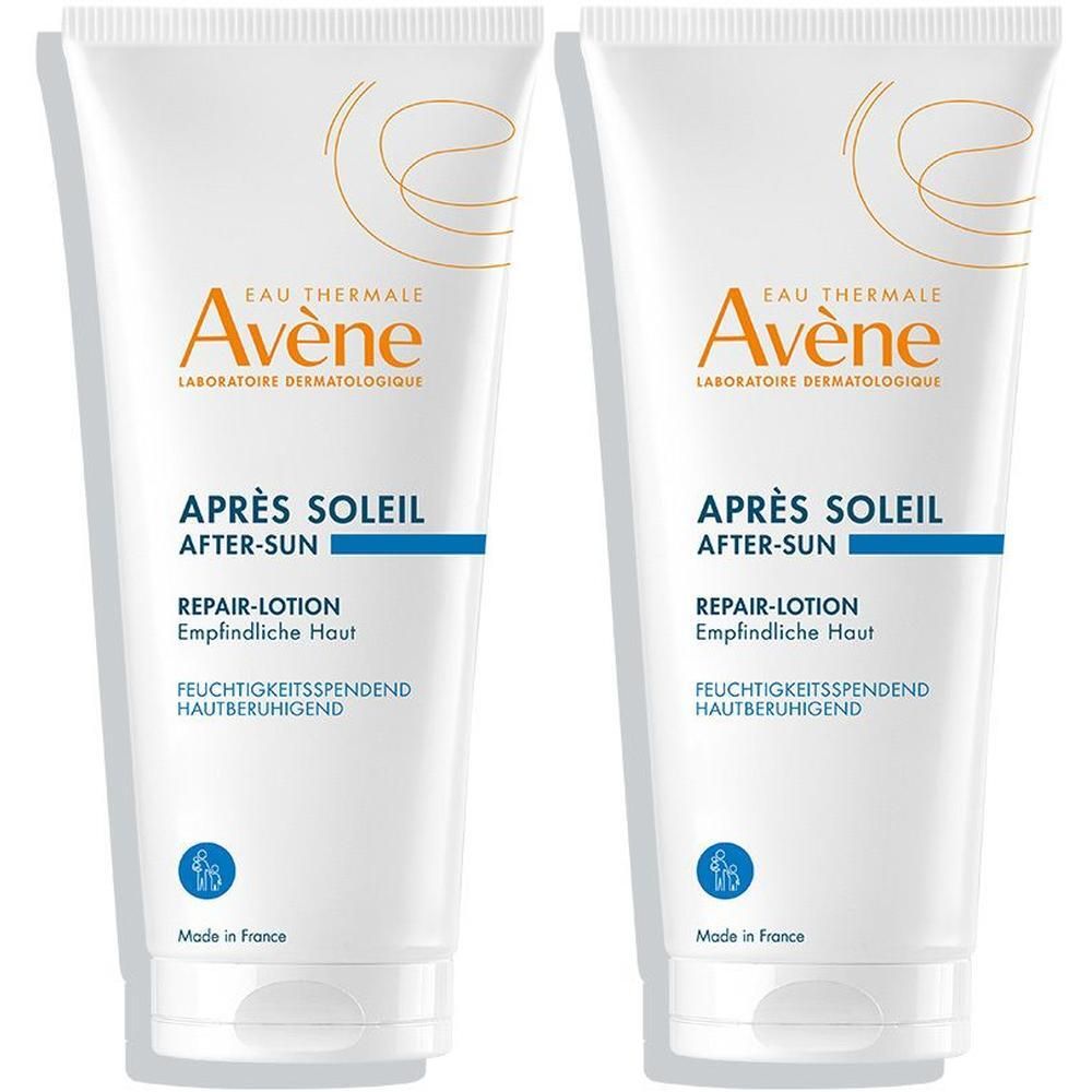 Zwei weiße Tuben Avène After Sun Repair-Lotion für empfindliche Haut.