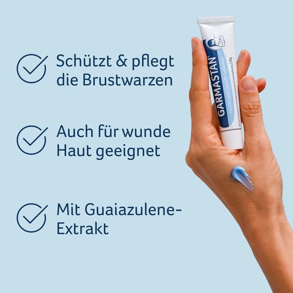 Main avec tube et crème. Texte: Protège & soigne, Aussi pour peau irritée, Avec extrait de guaiazulène.