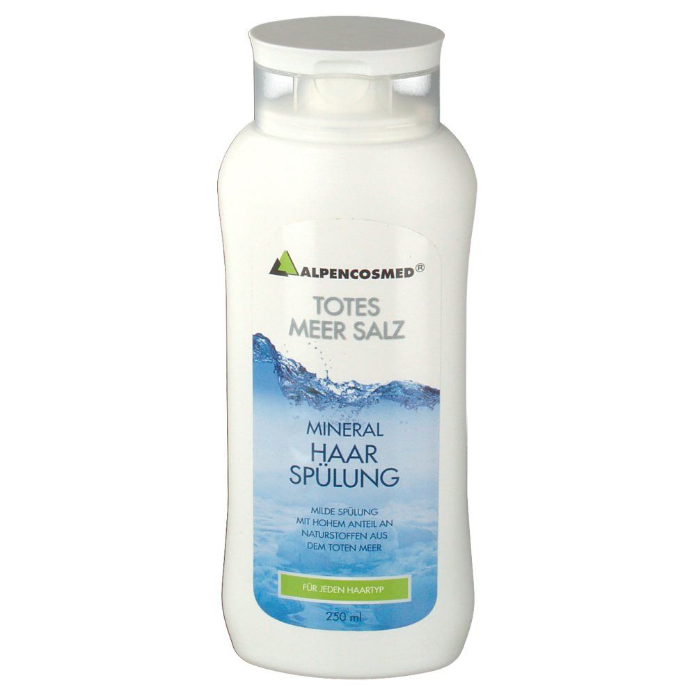 Weiße Flasche mit ALPENCOSMED® TOTES MEER SALZ Mineral Haarspülung. Blaue Wellen-Grafik. Grüner Schriftzug: Für jeden Haartyp.