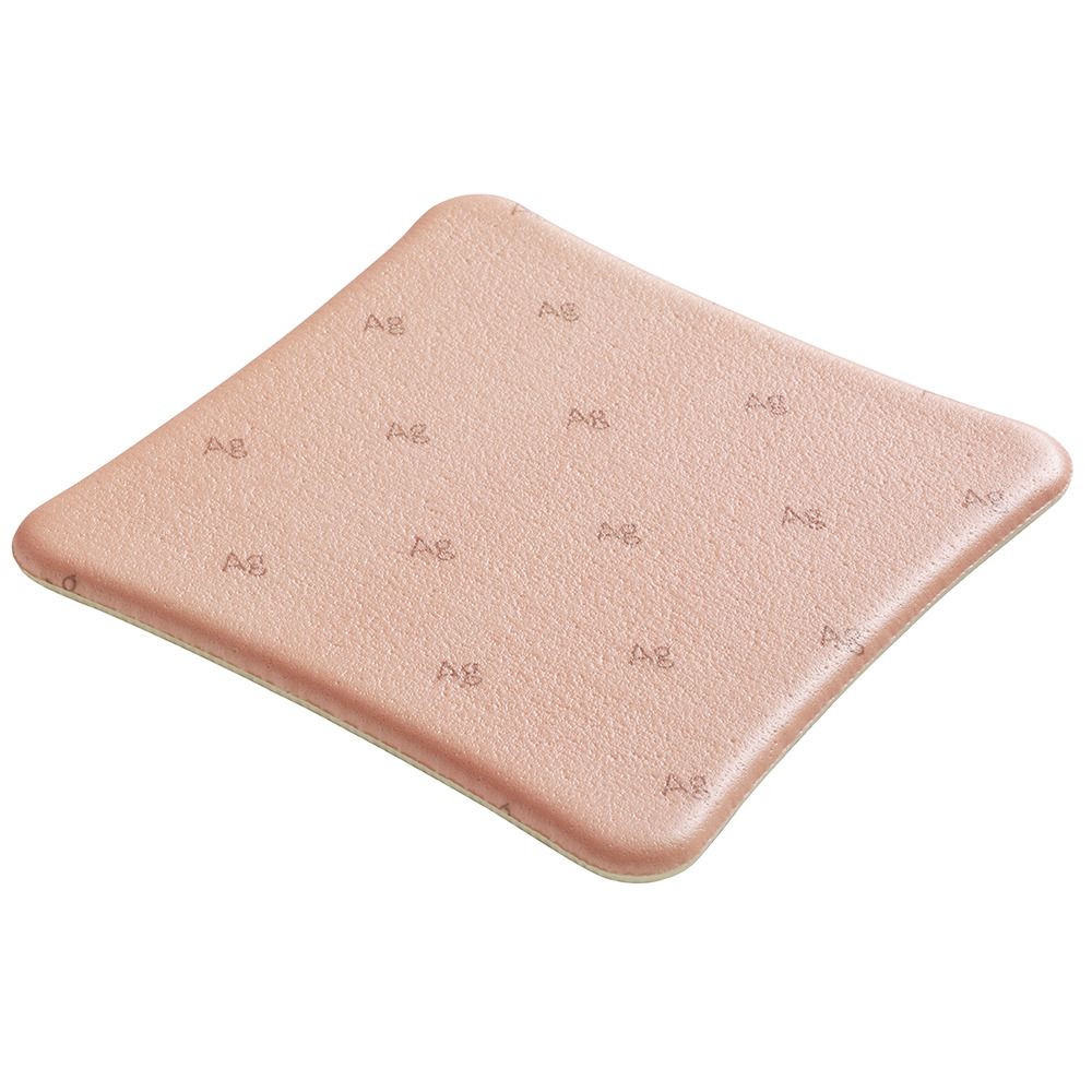 Quadratischer Wundverband, rosa, nicht haftend. Mit Prägung "Ag".