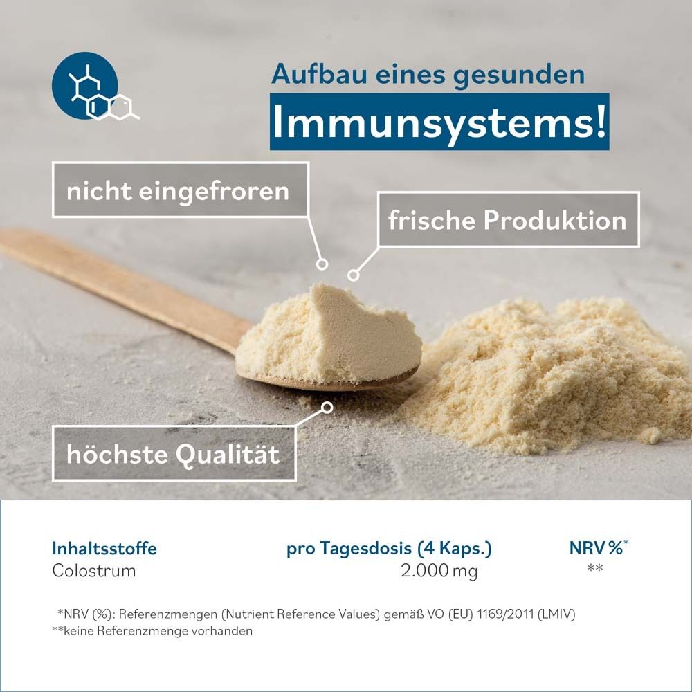 Holzlöffel mit Colostrum-Pulver. Text: Aufbau eines gesunden Immunsystems! 2.000 mg pro Tagesdosis.