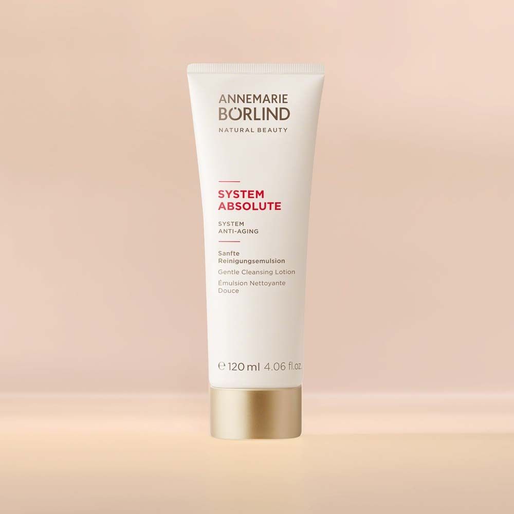 Weiße Tube mit Produktnamen und -bezeichnung. Goldfarbener Verschluss. 120 ml.