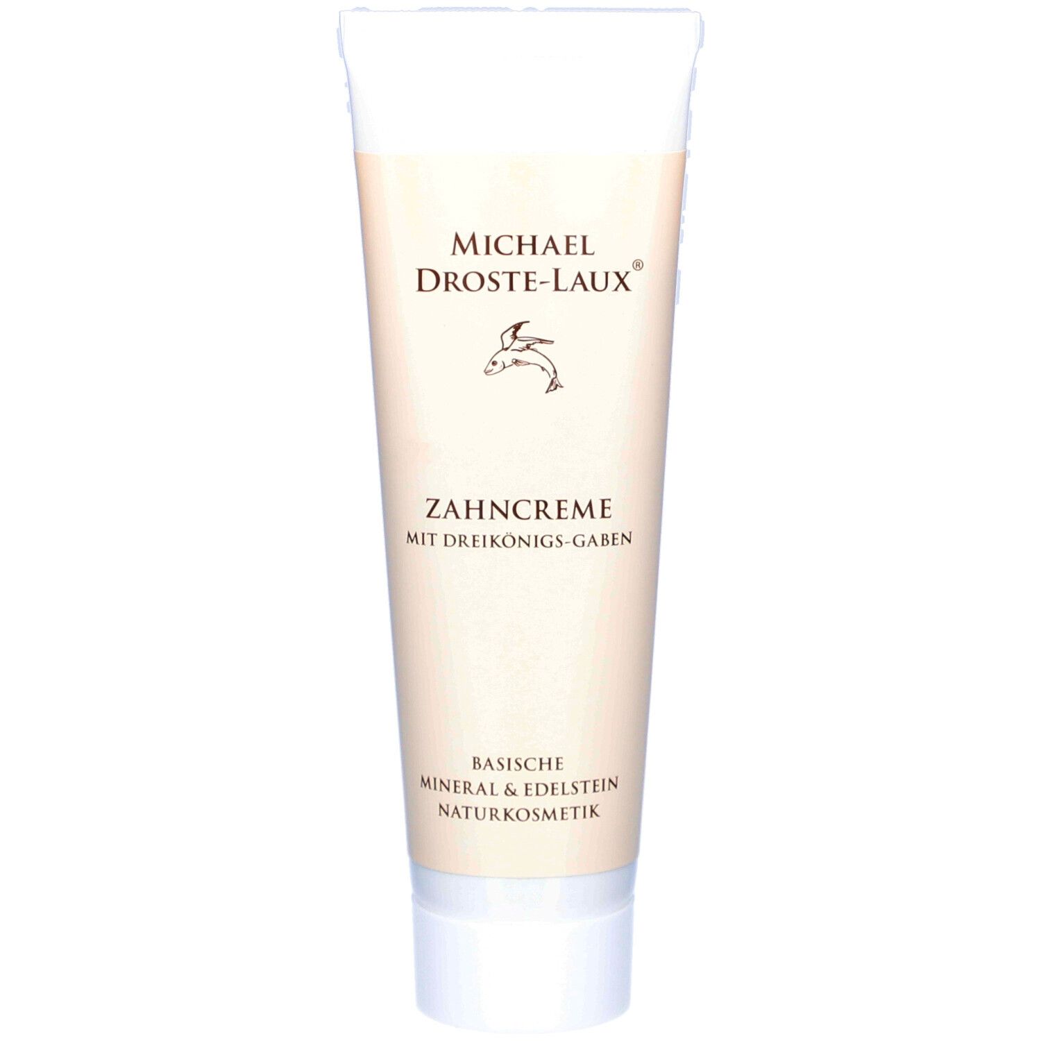 Zahncreme-Tube. Marke: Michael Droste-Laux. Text: Zahncreme mit Dreikönigs-Gaben. Basische Mineralien & Edelstein Naturkosmetik. Weiß-beige.