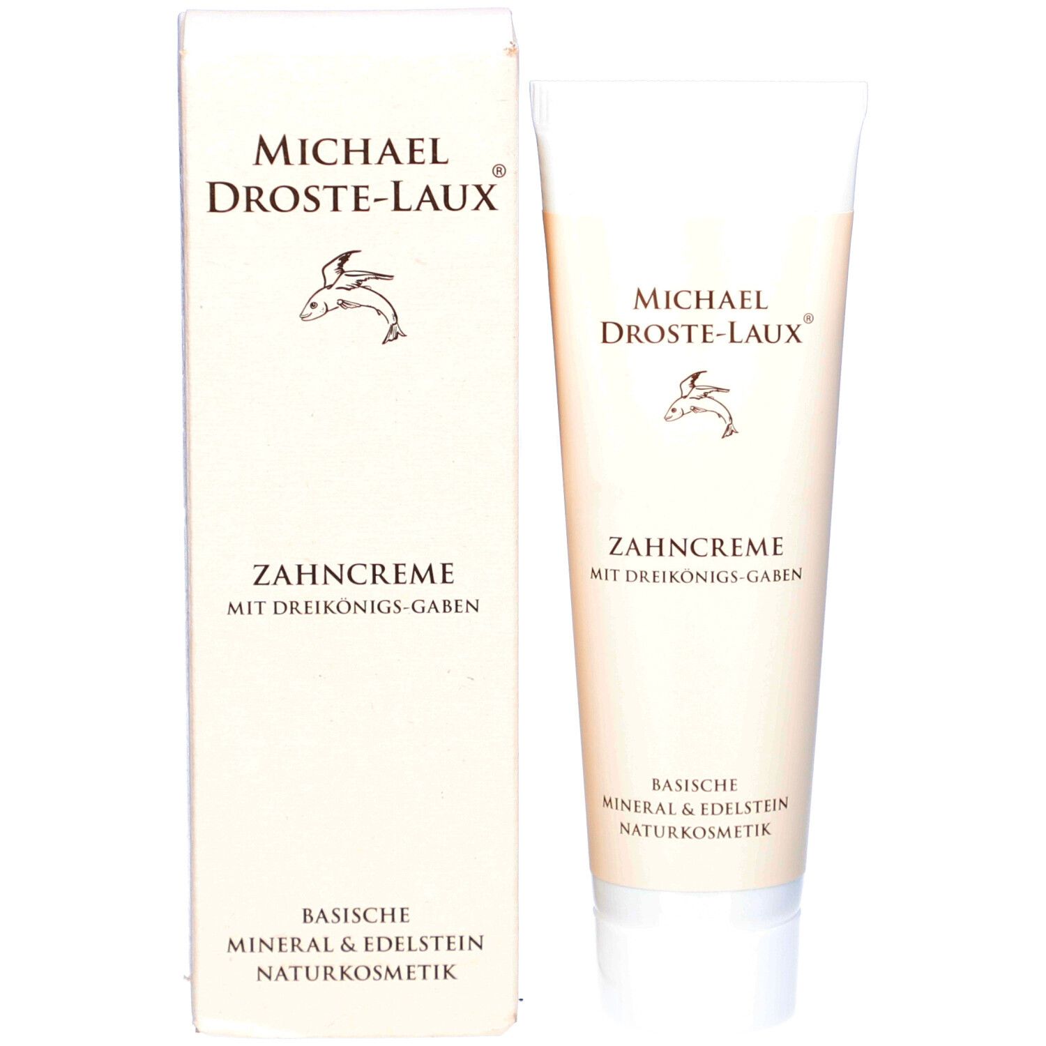 Zahncreme-Tube und Schachtel. Marke: Michael Droste-Laux. Text: Zahncreme mit Dreikönigs-Gaben. Basische Mineralien & Edelstein Naturkosmetik.