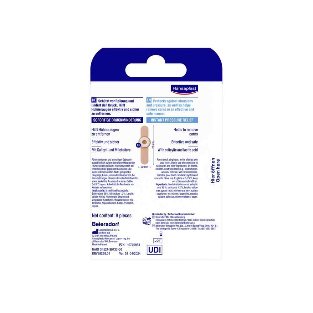 Rückseite der Verpackung des Hühneraugen-Pflasters. Text: Schützt vor Reibung und Druck. Hilft Hühneraugen zu entfernen. Mit Salicyl- und Milchsäure. Nettoinhalt: 8 Stück.