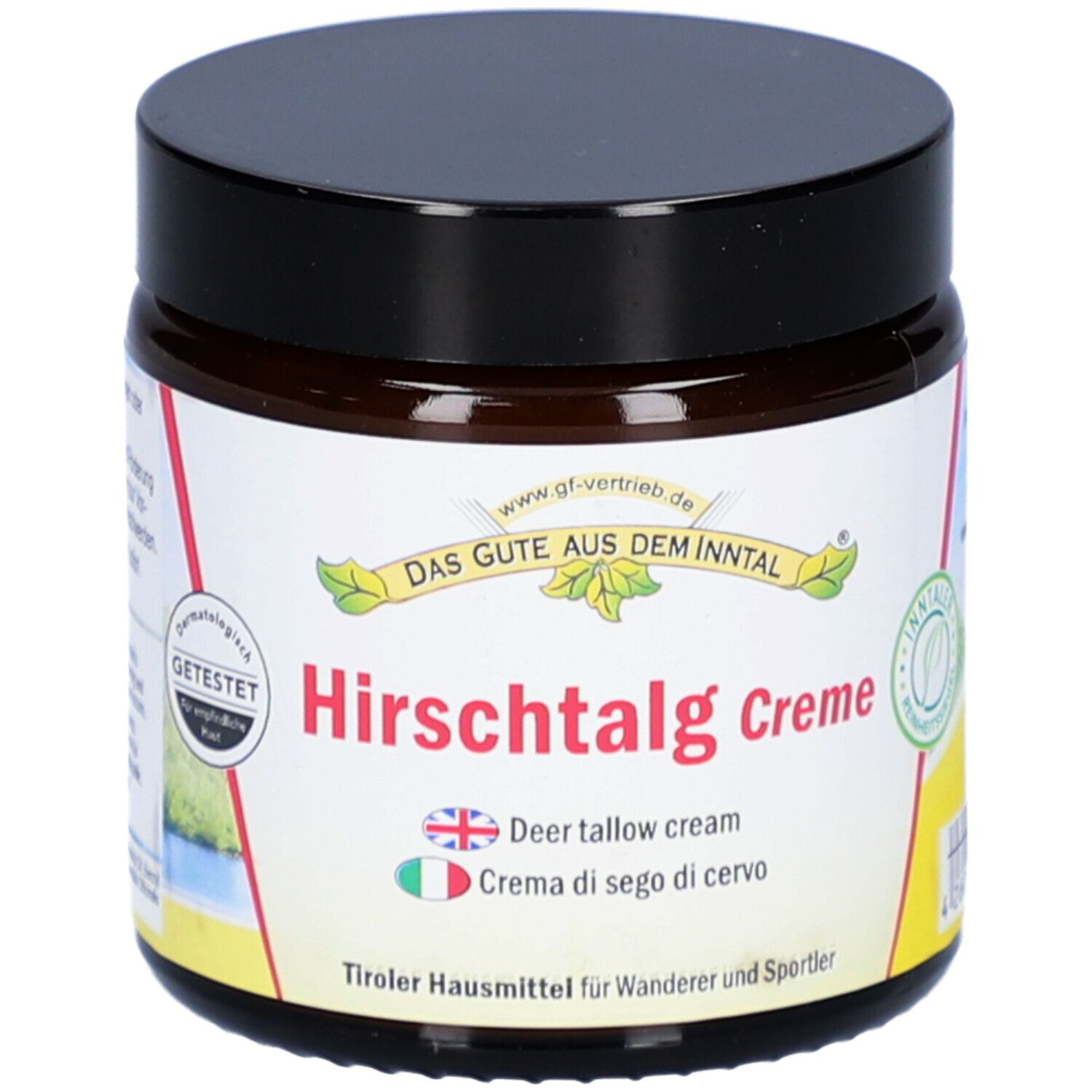Braunes Tiegel mit schwarzem Deckel. Auf dem Etikett steht "Hirschtalg Creme" und "Deer tallow cream".