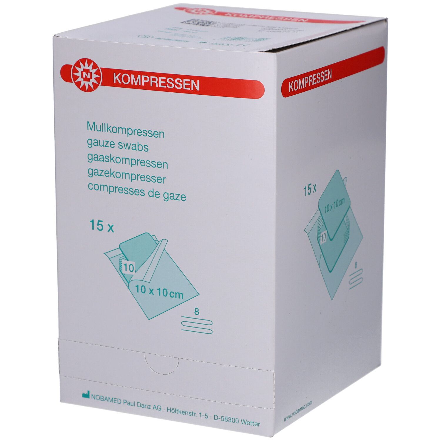 Weißer Karton mit roter Beschriftung. Aufdruck: Mullkompressen, 15 Stück, 10x10 cm. Marke: NOBAMED.