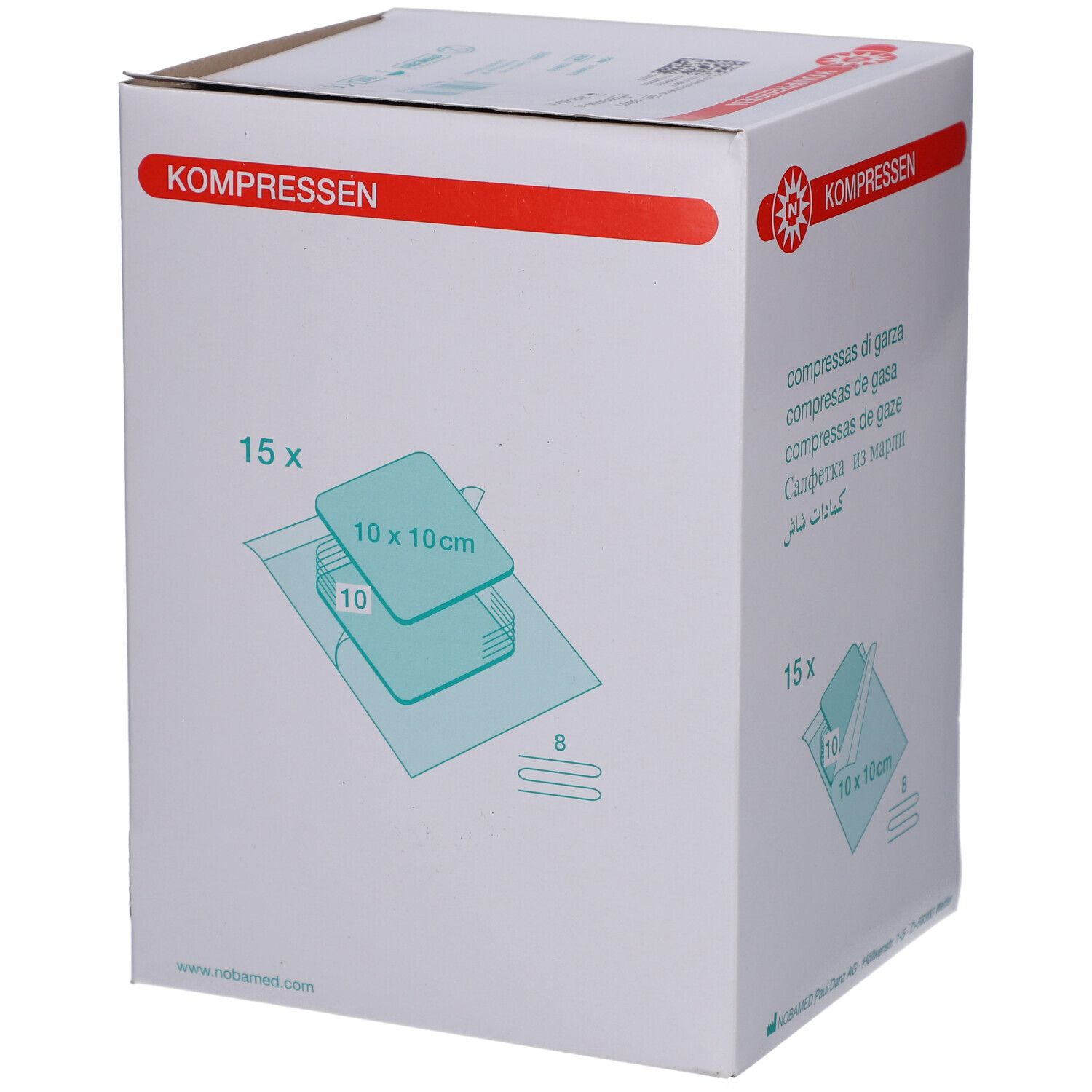 Weißer Karton mit roter Beschriftung. Aufdruck: Kompressen, 15 Stück, 10x10 cm. Marke: NOBAMED.