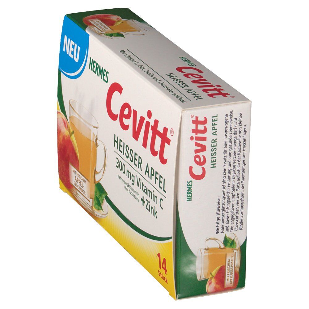 Schräg gestellte Cevitt Heisser Apfel Packung. Aufdruck: 300 mg Vitamin C + Zink. Hermes Logo. 14 Stück. Abbildung von Apfel und Getränk.